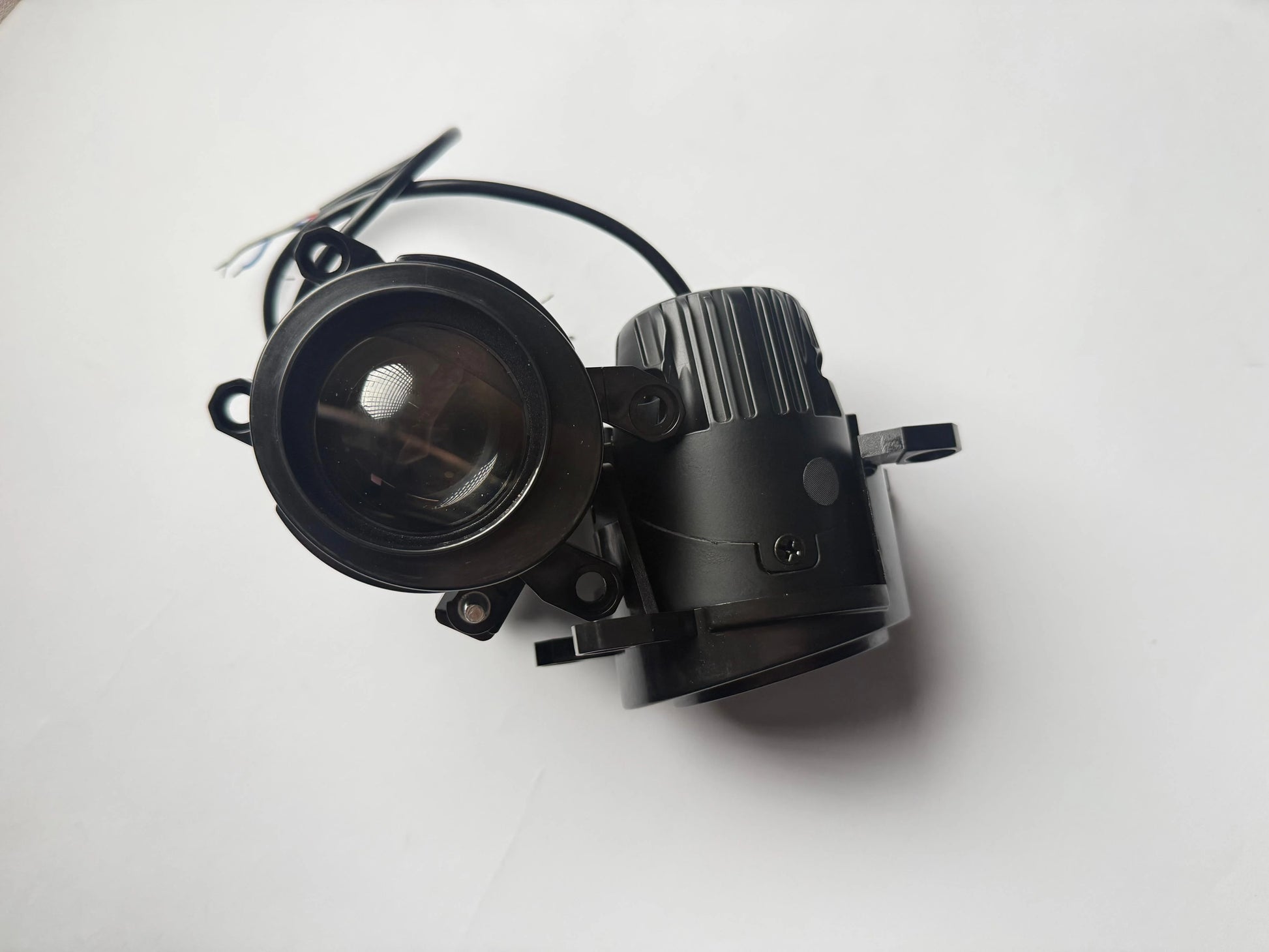 Universal L Series 2 inch projector light with focused beam lens design for improved automotive visibility and premium lighting performance