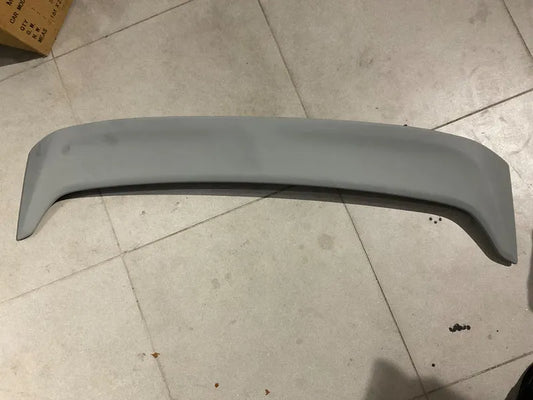 Universal fiber car roof spoiler with a sleek, aerodynamic design for enhancing car style and performance.

