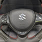 "Carbon Fiber Steering Wheel with Spiral for Suzuki Alto – Premium Grip, Sporty Look, and Durable Design."
