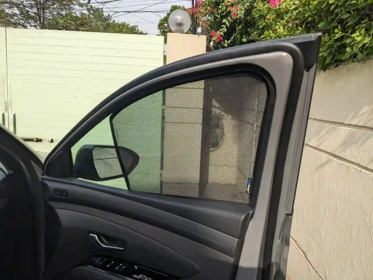 QS QuikSlide window sun shades installed on Hyundai Tucson HEV 2025-2026 side window