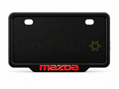 Raptic number plate frame installed on a Mazda bumper