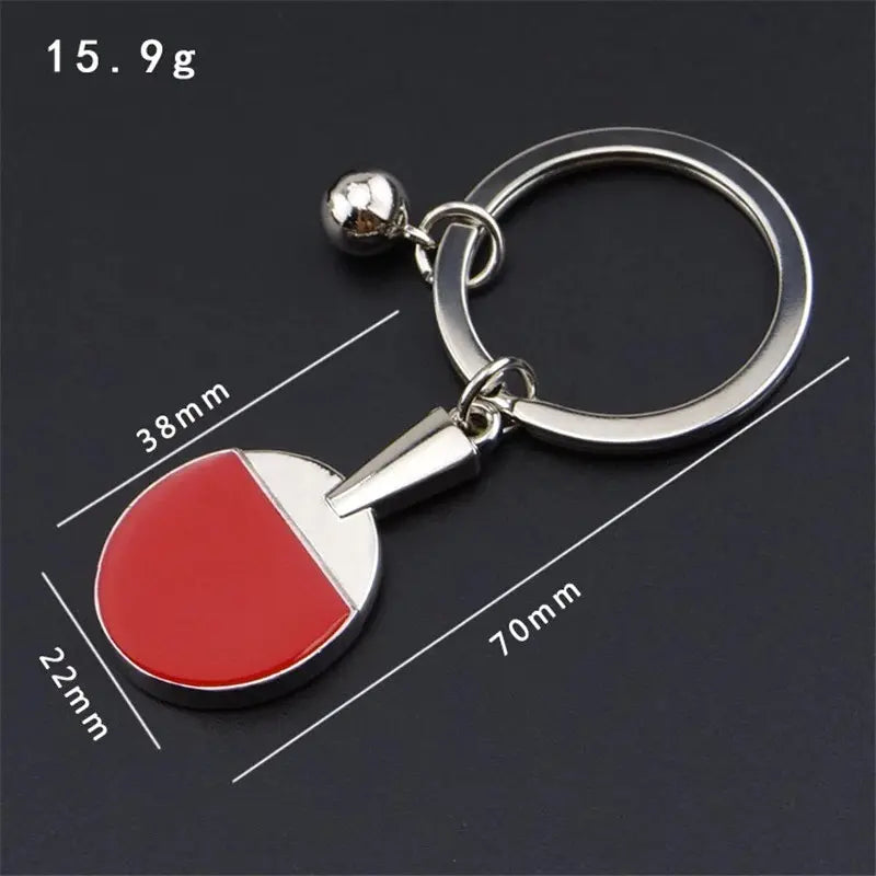 Table tennis ping pong key chain with miniature paddle and ball design