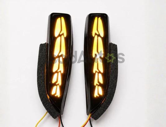 Toyota Corolla Dragon Style LED mirror turn signal lights with white DRL and sequential yellow indicator by Asad Autos.