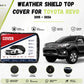 Weather shield top cover protecting Toyota Revo 2015-2026 from rain and dust while parked outdoors - Asad Autos